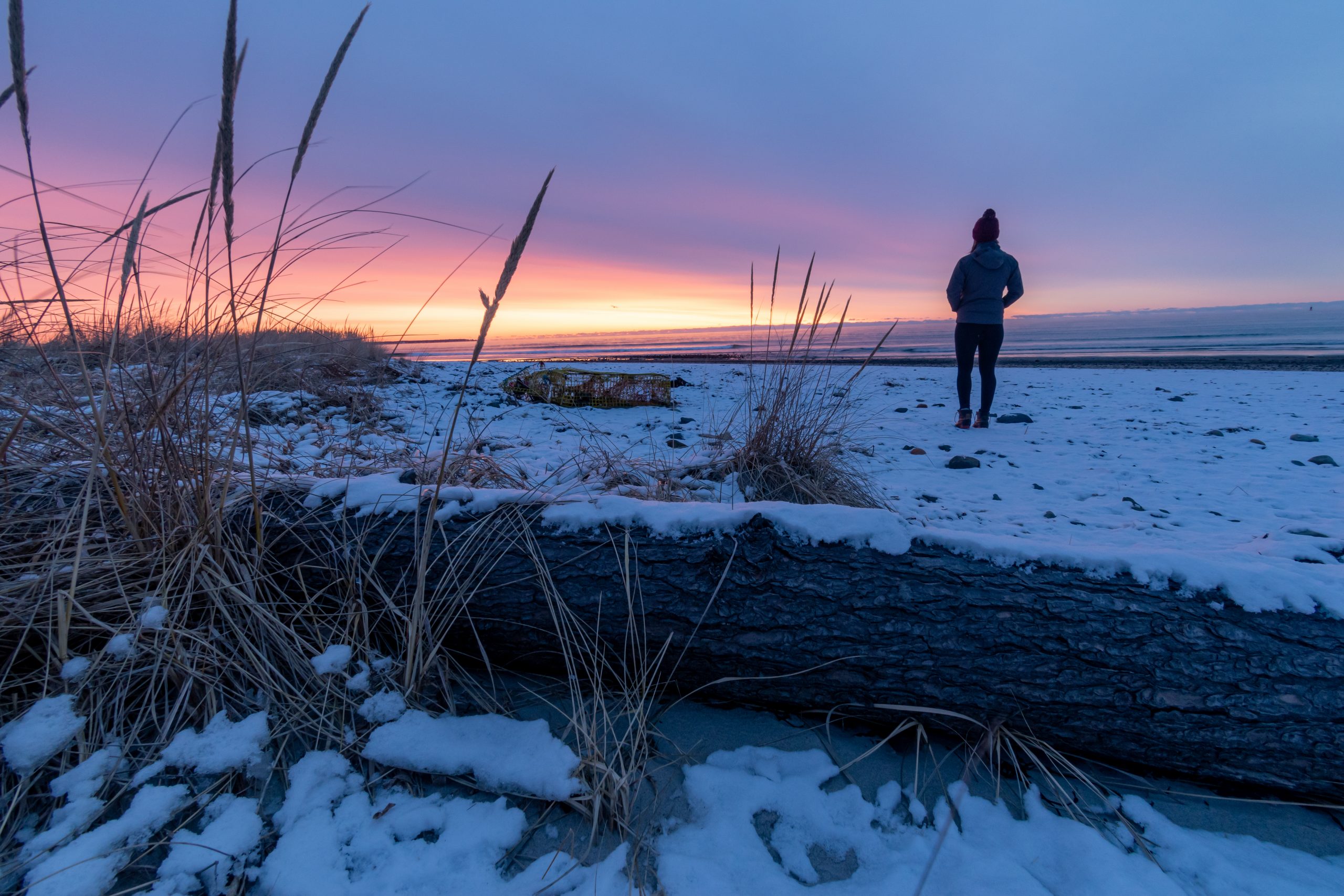 Sunrise on Drakes Island Beach with woman silhouette - Wells, Maine
